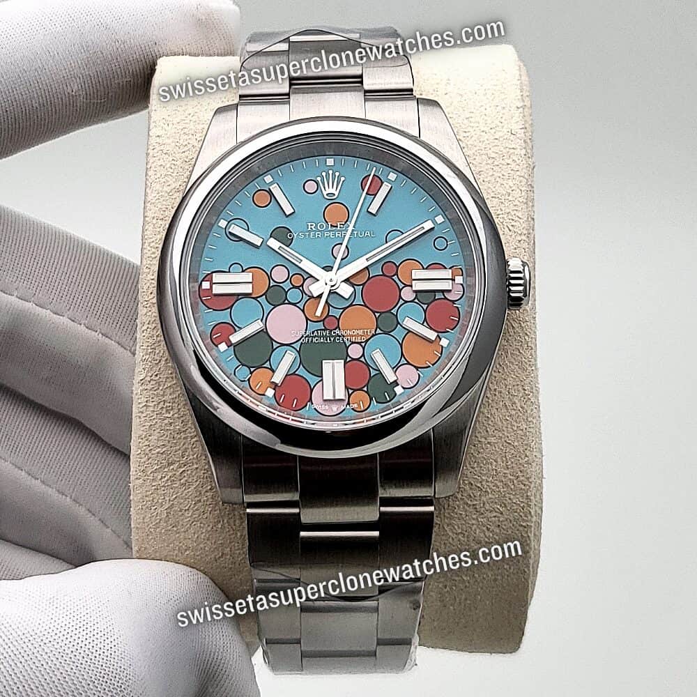 Rolex Oyster Perpetual 41mm Turquoise Blue Celebration Motif Dial Swiss ETA 3230 Automatic Movement Replica Top Quality Exact 11 Super Clone Watch (1)
